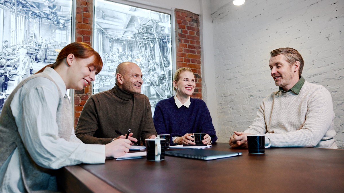 Sako employees in a meeting